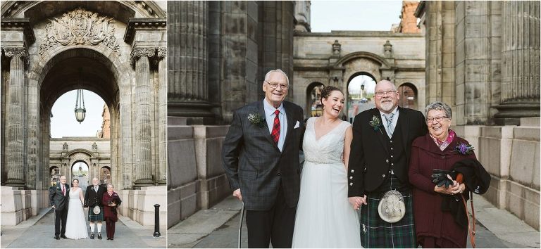 family-pose-in-fornt-of-arches-for-group-shot