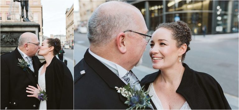 newly-wed-couple-kiss-bride-looks-at-groom