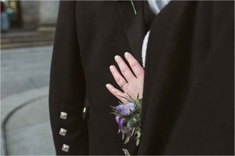 brides-hand-on-husbands-chest