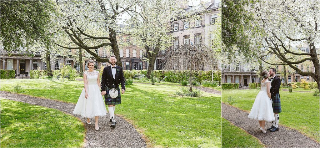 bride-and-groom-walk-through-private-garden-with-cherry-blossom-in-blooming