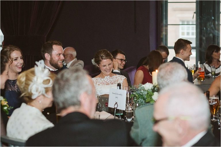 bride-laughs-as-her-husband-gives-speech