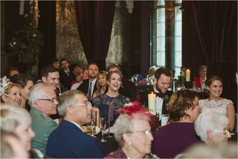 bridesmaid-laughs-as-groom-gives-his-speech