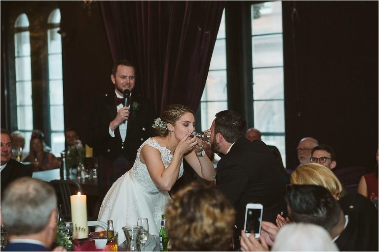 bride-and-groom-drinking-from-brautbecher-at-wedding