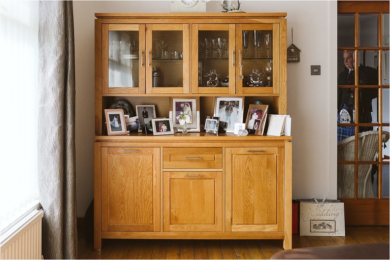 dresser-full-of-family-photos