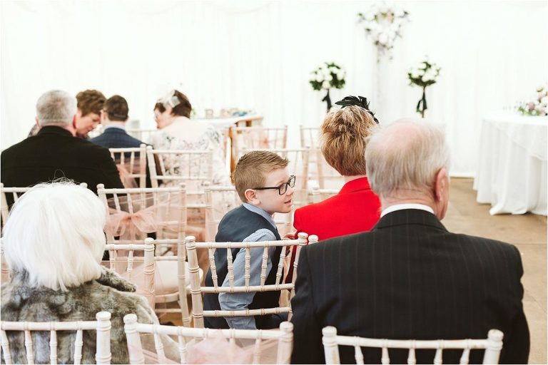 young-guest-seated-for-wedding-ceremony