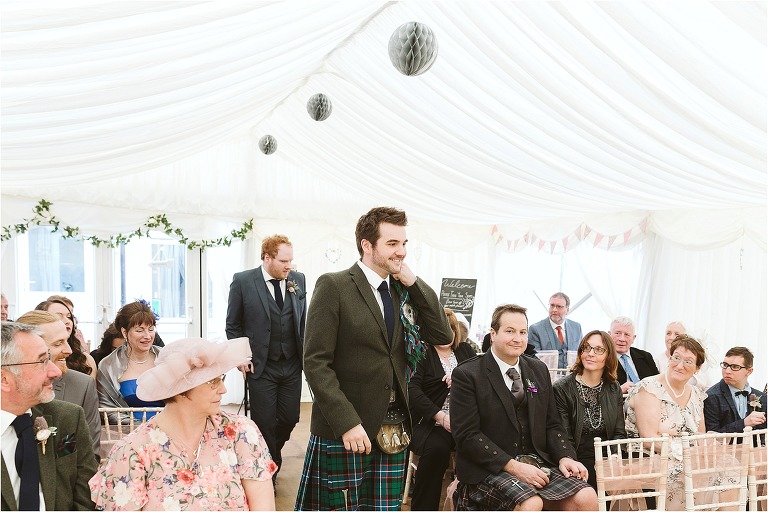 groom-and-best-man-enter-for-ceremony