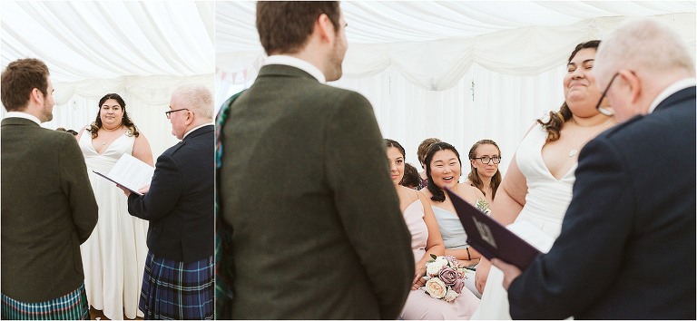 bride-looks-at-groom-bridesmaids-laughing