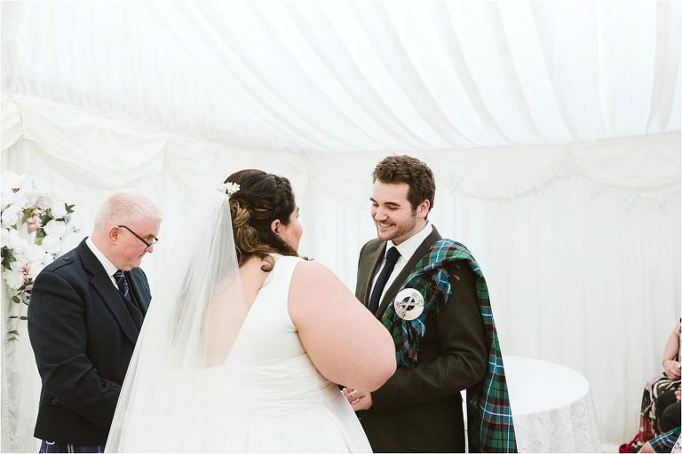 grooms-laughing-with-bride