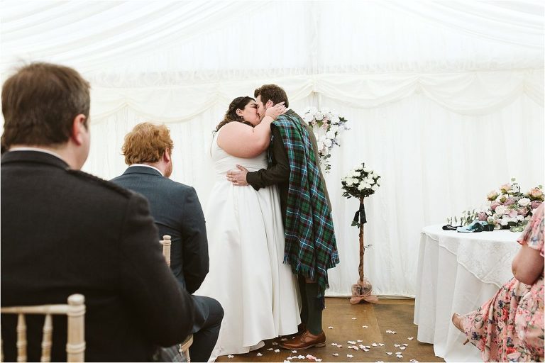 bride-and-groom-have-first-kiss
