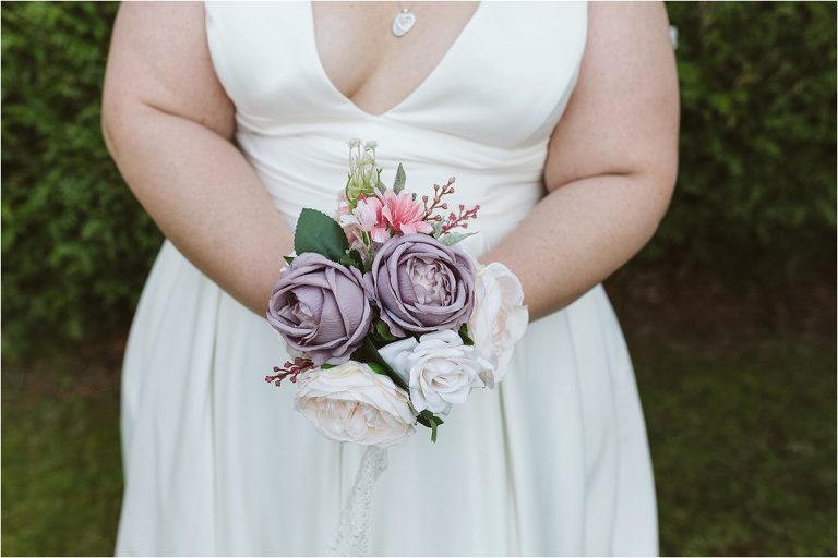 detail-photo-of-brides-faux-bouquet-of-roses