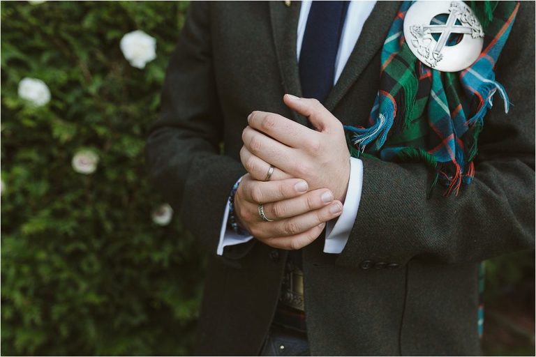 close-up-of-grooms-hand-and-wedding-ring