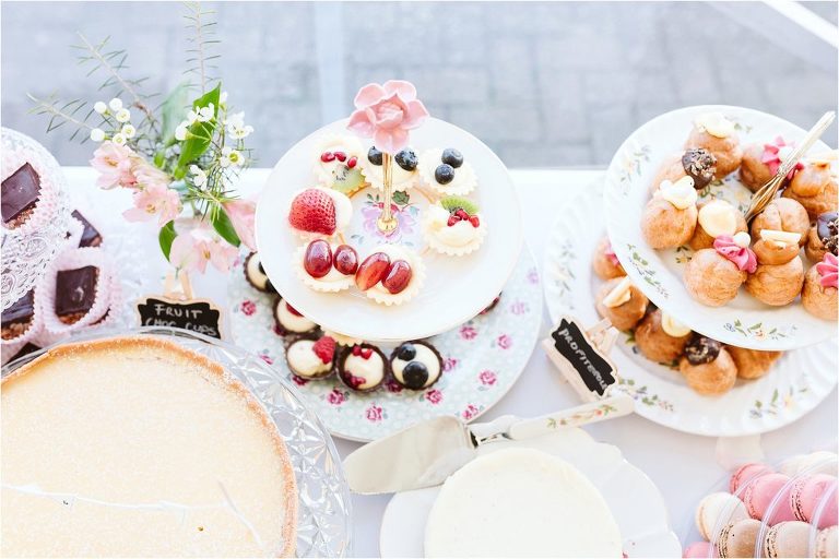 vintage-white-and-pink-cake-tier-stand-with-desserts