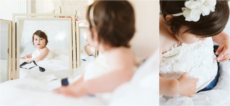 little-girl-looks-at-reflection-of-herself-in-mirror