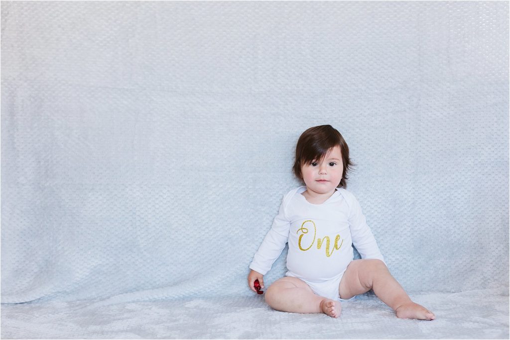 little-girl-sitting-on-floor