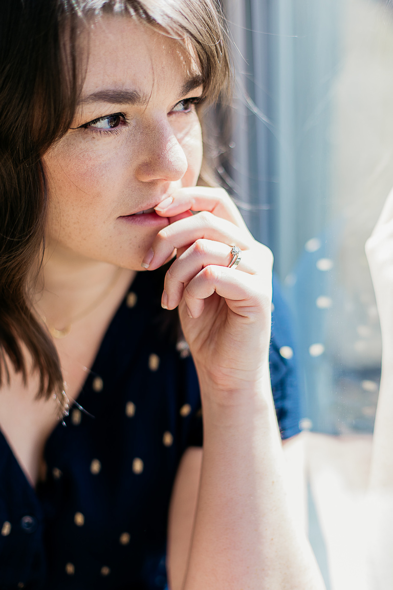 woman-looking-out-of-window