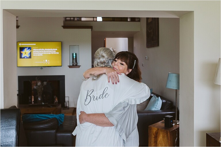 mother-of-bride-hugging-daughter