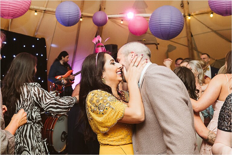 guests-smiling-while-dancing-at-wedding-reception