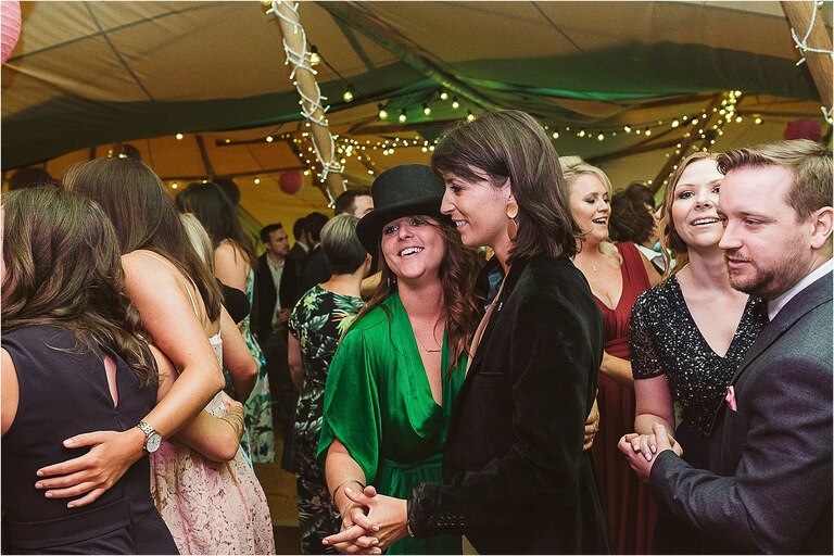 guests-dancing-at-tipi-wedding-reception