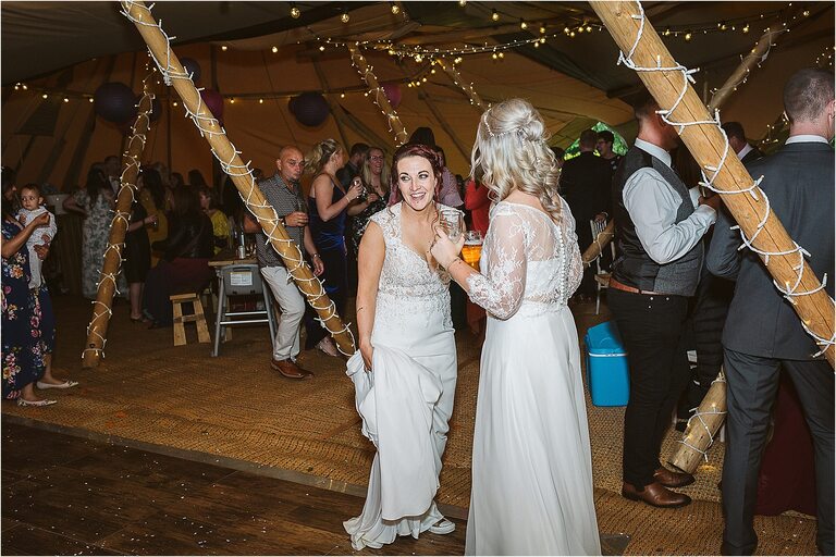 wife-and-wife-on-dance-floor-laughing