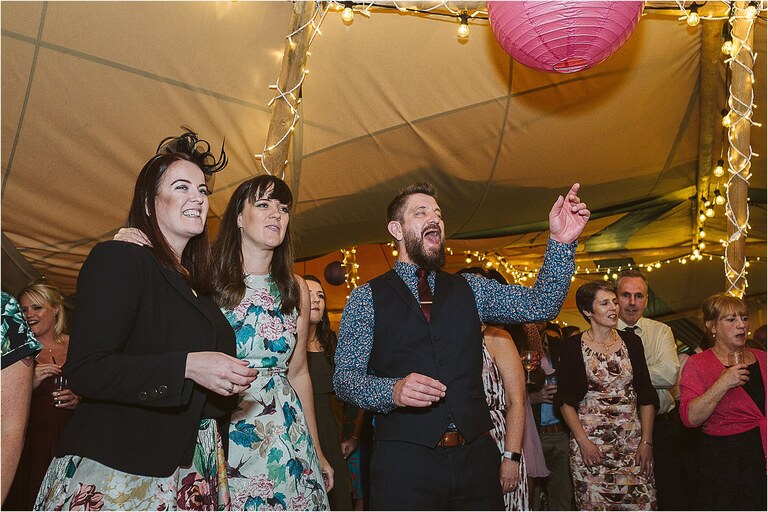 guests-cheering-while-on-the-dance-floor