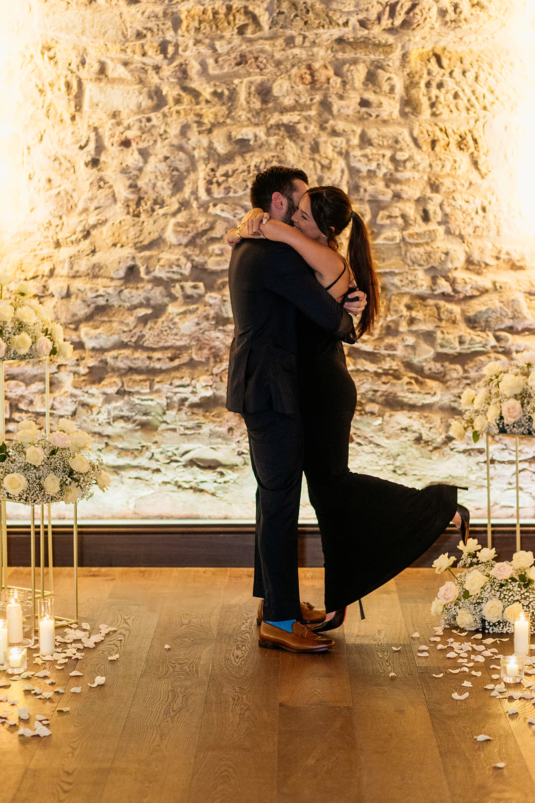 couple-hug-asthey-have-just-got-engaged-the-woman-is-bring-picked-up-by-her-fiance